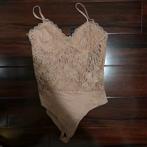 Pink/nude bodysuit. Fits like a M/L